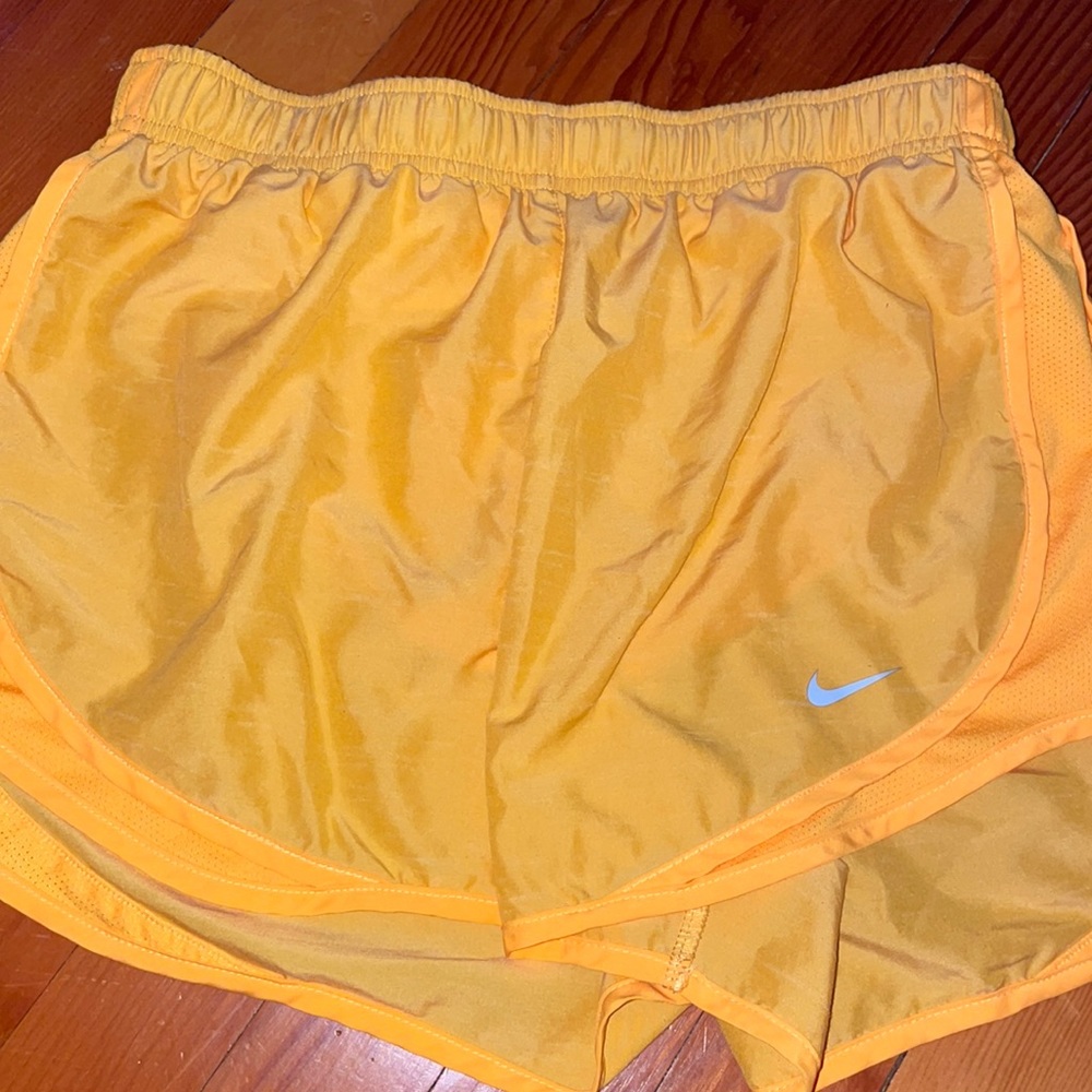Women’s Medium Nike Short. Bright Orange.